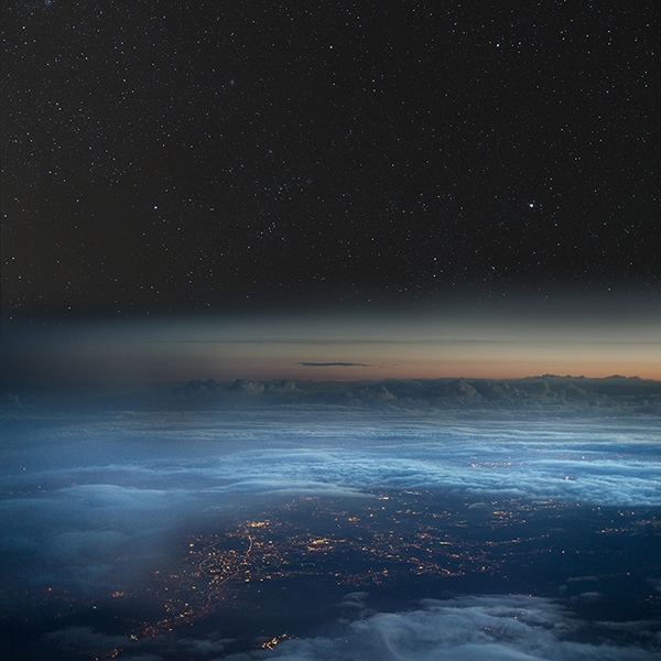 The Earth at night. City lights below, stars above by Marcel Clemens, Astrophysicist, Photographer, UK