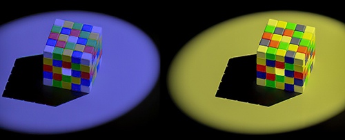 Colour constancy. The tiles on the top of the left-hand cube appear yellow, and the tiles on top of the right-hand cube appear blue. However, these tiles are identical colourless greys. Our model can help explain how objects appear to be the same colour even when the light changes, and why in illusions such grey looks colourful. by Dr. Jolyon Troscianko, Vision Scientist, UK