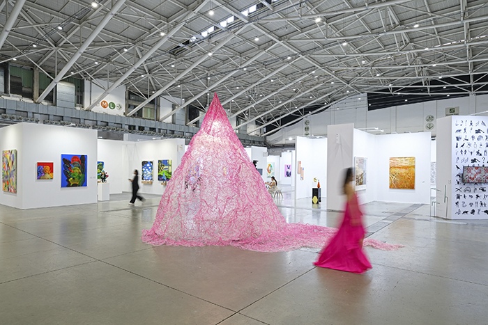 Indefinite Pink, 2024, mixed media (thread, resin, metal structure, light bulb), H4 x W4 x D6 m by Julia Hung, Weaving Artist, Taiwan