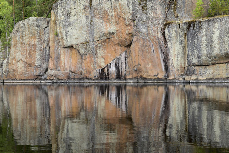 Painted rock of Keltavuori in Southeastern Finland by Julia Shpinitskaya