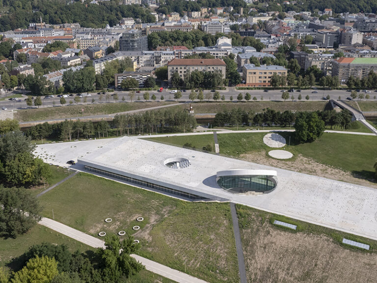 SMAR Architecture Studio tops Lithuanian science museum with solar-inspired disc