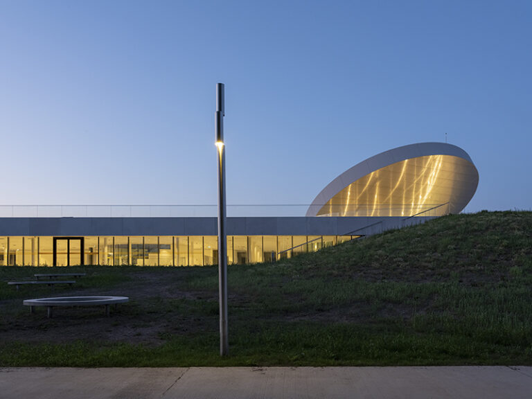 SMAR Architecture Studio tops Lithuanian science museum with solar-inspired disc