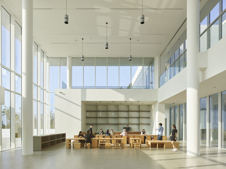 Custom-designed exhibition spaces utilize controlled daylight to create ideal viewing conditions