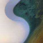 Emerald lagoons nestled within white sand dunes at Lençóis Maranhenses, Brazil by Daniel Kordan