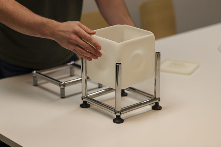 3D-printed lighting panels housed within a USM Haller modular frame system by Gantri.