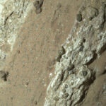 Perseverance imaged “Cheyava Falls” in Jezero Crater in July 2024, revealing leopard spot patterns in a reddish mudstone that may record chemical reactions once able to support microbial life. Other explanations remain under study.