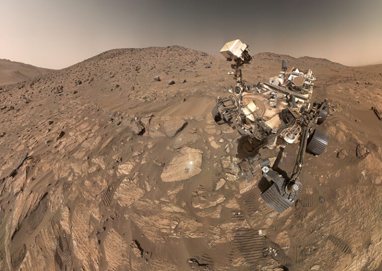 Perseverance captured this selfie on July 23 using a mosaic of 62 images in Jezero Crater. To the left of the rover near the center sits the rock nicknamed Cheyava Falls, whose features may inform the search for ancient microscopic life on Mars.