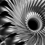 © Adobe Stock / ID 412938014 — 3D render of metallic fractal spiral with turbine-like geometry.