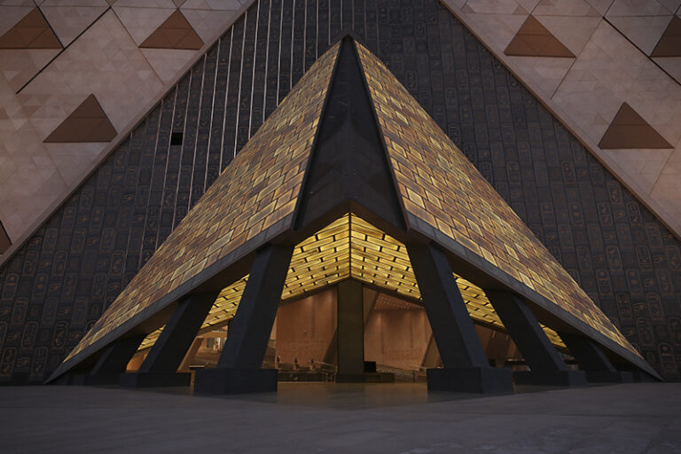 The glowing pyramid canopy marks the main entrance of the Grand Egyptian Museum, echoing the geometry of the Giza pyramids while leading visitors into the Grand Hall.