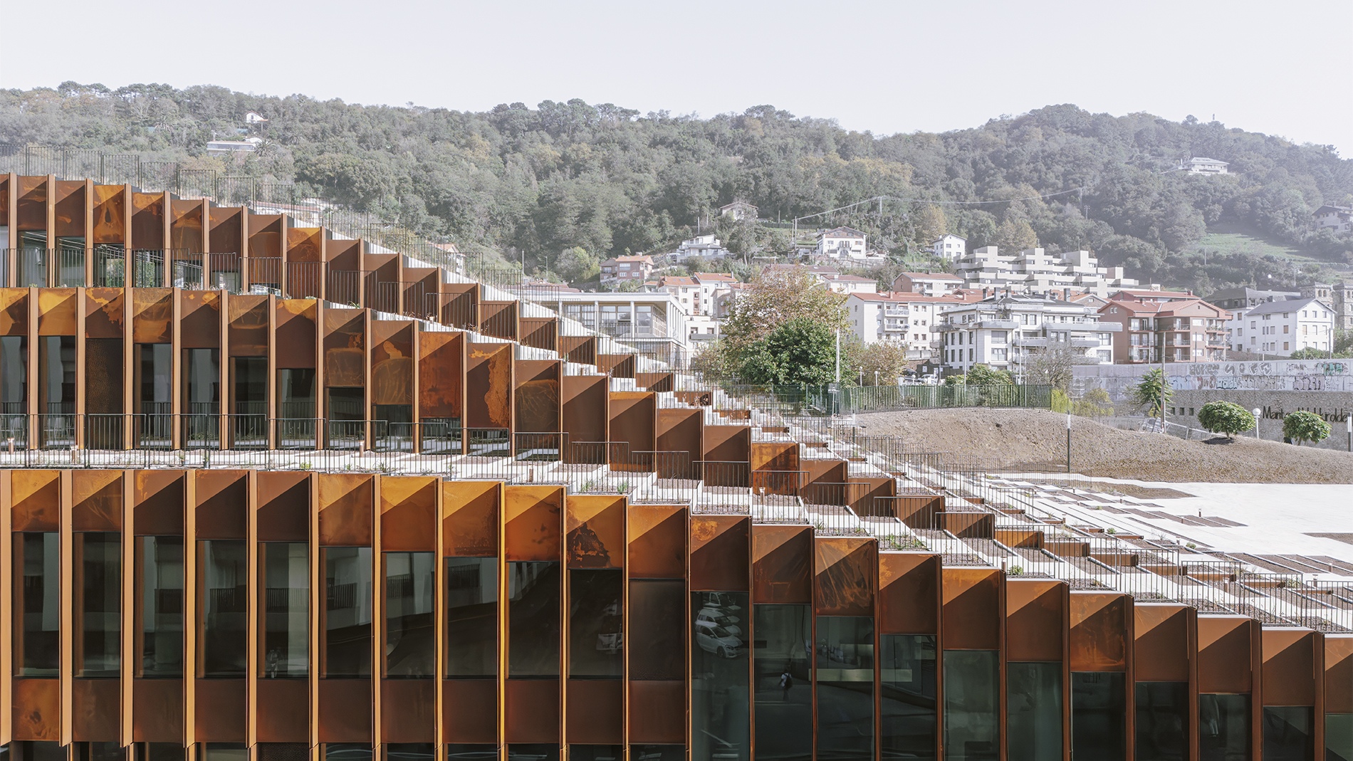 GOe's cascading terraces mirror the hills of San Sebastián, integrating the research centre into the urban landscape.