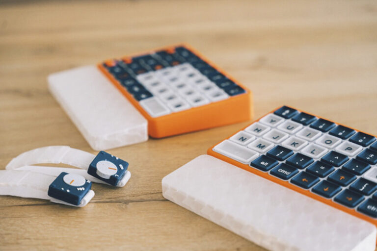 Galli chose a vibrant orange for the modular keyboard and a watch-inspired design for the wearable device to reduce medical stigma.