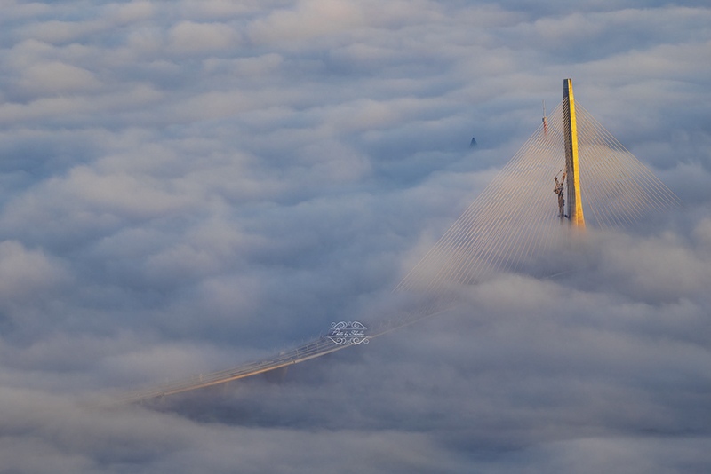 Danjiang Bridge mast above fog