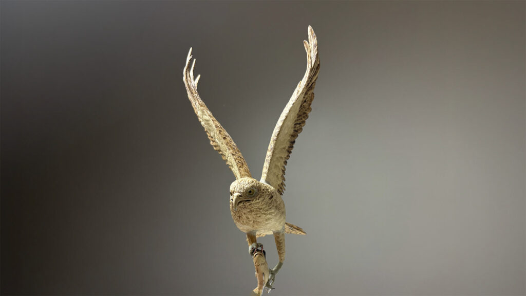 Osprey sculpture in progress, depicting an osprey returning with a freshly caught fish.