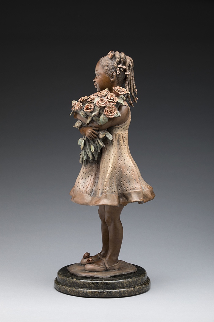 Strawberry Sweet. A girl hugging a bouquet of roses, bronze.